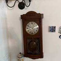 Orologio antico a pendolo