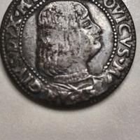 moneta antica con numeri romani