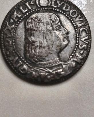 moneta antica con numeri romani