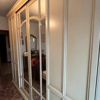 Camera con armadio scorrevole