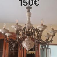 Lampadario, sci, libri