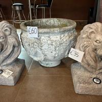 Statue leone e vaso