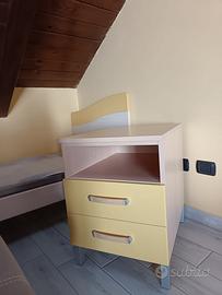 Letto singolo e comodino