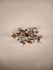 lampadario in ferro con portalampada a forma di fo