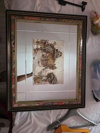 Quadro specchio vintage con piastra in argento