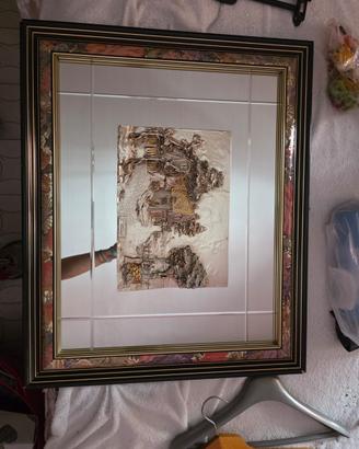 Quadro specchio vintage con piastra in argento