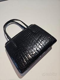 borsetta in coccodrillo ponpon