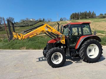 New Holland TS 100 con caricatore frontale Sigma4