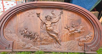 Scultura in legno in altorilievo