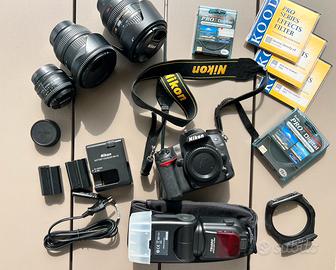 Nikon d7000 kit con tre lenti e batterie