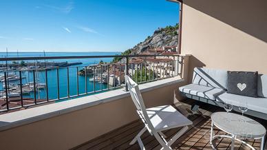 Porto Piccolo, terrazza vista mare
