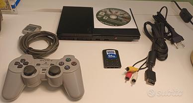 PlayStation 2 Slim  con gioco WWE + Accessori