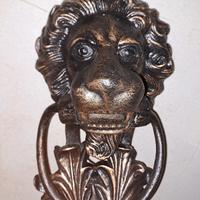 Batacchio, battente porta testa di leone