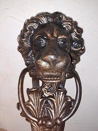 Batacchio, battente porta testa di leone