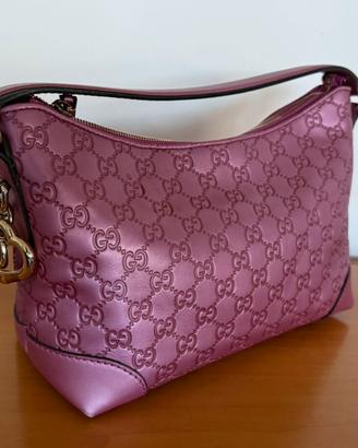 Borsa Gucci in pelle rosa con motivo GG