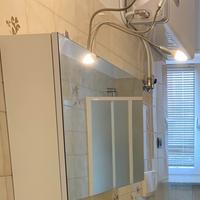 Specchio bagno contenitore con anta a ribalta