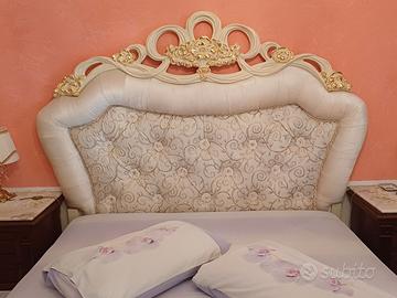 Trittico camera matrimoniale con letto tappezzato