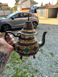 Teiere metallo e pietre