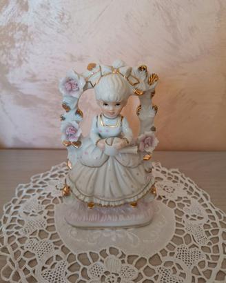 Vecchia statuetta bambina in ceramica Capodimonte