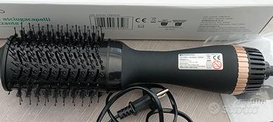 Spazzola capelli piega e asciugatura.