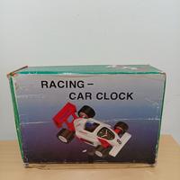 Orologio Vintage con Macchina da Corsa