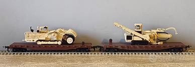 Pianali con macchine edili stradali