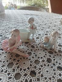 set di 3 bambini in porcellana