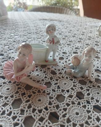 set di 3 bambini in porcellana