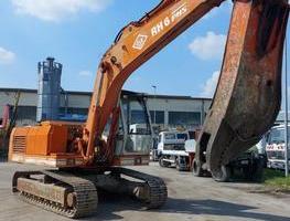 ESCAVATORE CINGOLATO O&K RH6 PMS CON CESOIA CMI