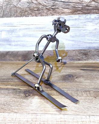 Scultura viti e bulloni sci alpino sciatore slalom