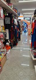 Negozio avviato con clientela e magazzino