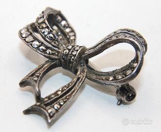 Stupenda spilla fiocco Vintage argento marcasite