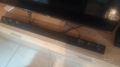 soundbar LG con subwoofer dolby 
