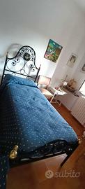 Letto singolo in ferro battuto con decoro ('900)
