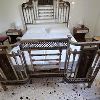 Letto antico in ferro battuto