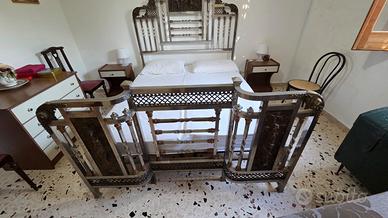 Letto antico in ferro battuto