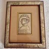 Bassorilievo in argento "Signora con cappello"