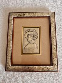 Bassorilievo in argento "Signora con cappello"