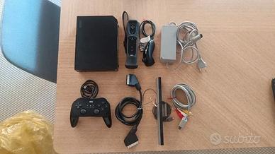 Console Nintendo Wii nera con accessori e pad