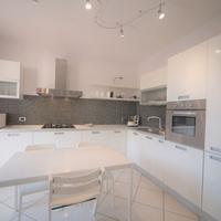 Cucina Pedini bianca lucida angolare 7 metri 4+3 