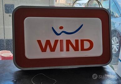 insegna luminosa Wind telefonia 