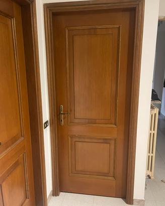 Porte battente in legno