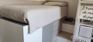 Letto con armadio sottostante