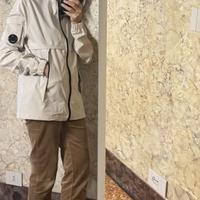 Giacca stile C.P. Company, colore beige/panna.