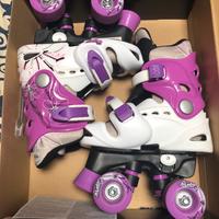 Pattini a rotelle, casco, paragomiti e parastinchi