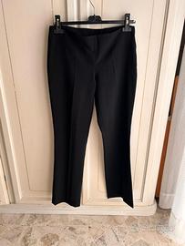 Pantaloni neri a zampa di elefante