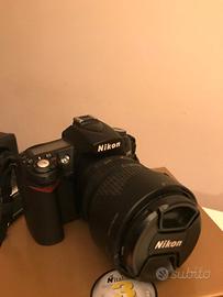 NIKON D90 macchina fotografica + Nikkor 18-105 . 
