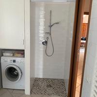 Soffione doccia con tubo flessibile ed asta