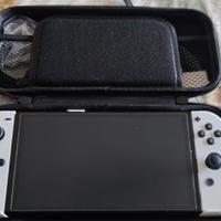 Nintendo Switch+4 giochi+Grips Skull&Co.