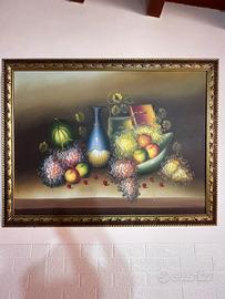 Natura morta,eta classica,cornice dorata barocca.